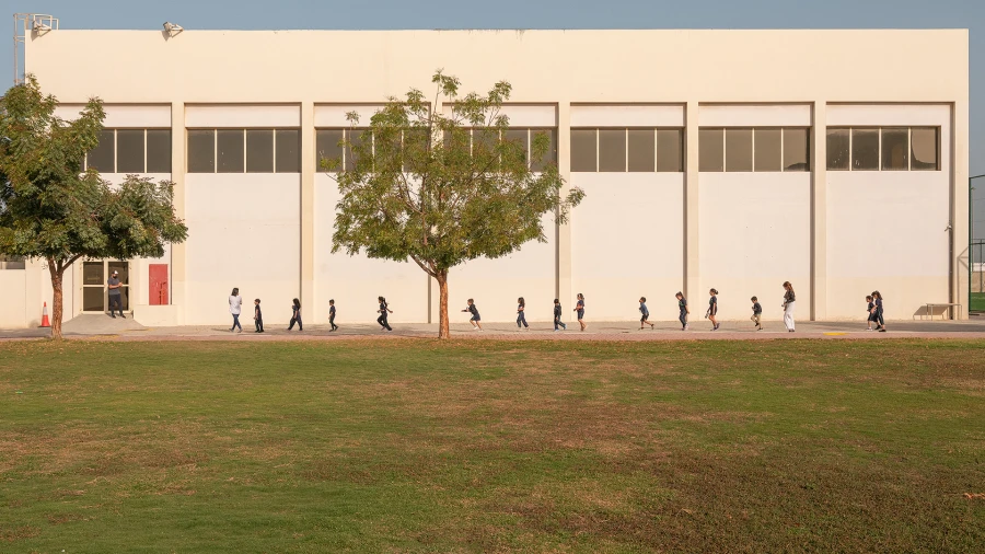 WellSpring Private School address elementary class in line walking to the gym